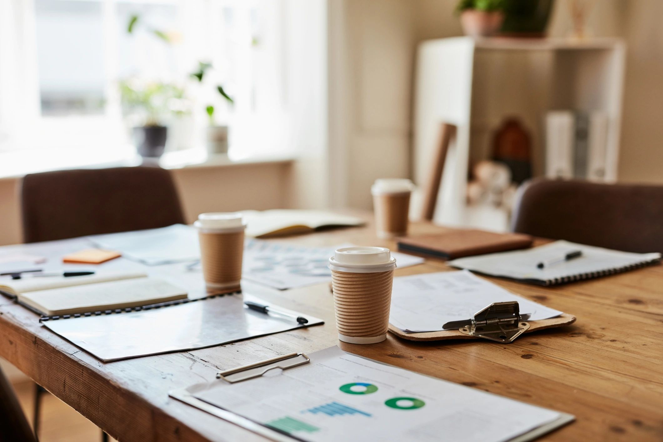 Meeting table with documents in a professional office